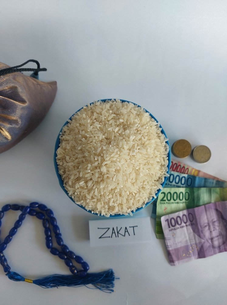 Zakat,Donation,For,Muslim,During,Ramadan,,Rice,And,Money,,Open