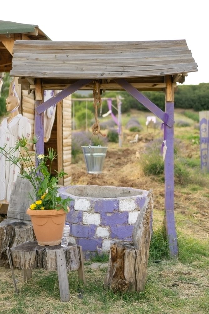 Colored,Ornate,Water,Well,In,The,Garden